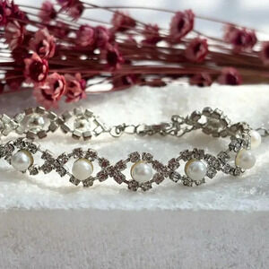 Vintage Silver Toned Faux Pearly Eyes Accent Rhinestone Crossover Bracelet